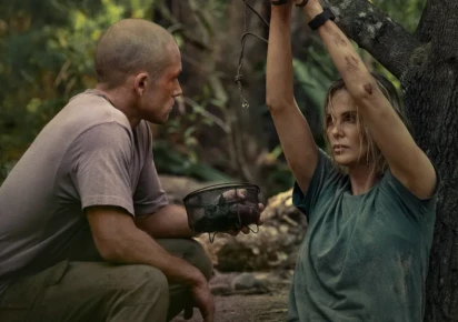 Netflix releases the Apex trailer starring Charlize Theron and Taron Egerton in a tense survival thriller set in the Australian wilderness.