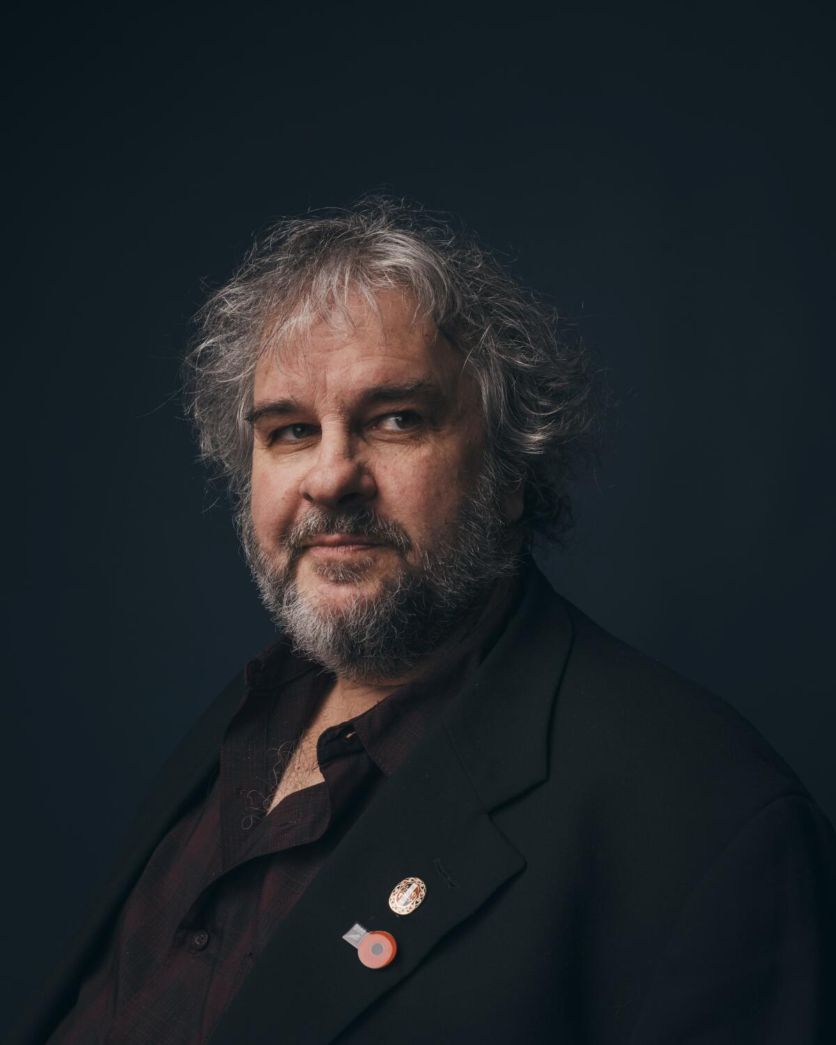 Peter Jackson Net Worth: How a Visionary Filmmaker Built a Billion-Dollar Empire The Billion-Dollar Transformation of a Director Few filmmakers have successfully bridged artistic ambition and financial scale as effectively as Peter Jackson. As of March 2026, his net worth is estimated to range between $1.7 billion and $1.9 billion, placing him among the world’s wealthiest figures in entertainment. What distinguishes Jackson’s financial trajectory is not merely blockbuster success, but a strategic expansion into technology, intellectual property, and long-term production ventures. His rise to billionaire status in 2021 marked a pivotal shift—from filmmaker to media entrepreneur. The Defining Deal: Weta Digital and the Billionaire Leap Jackson’s most significant financial milestone came in 2021, when he sold a substantial portion of his visual effects company, Weta Digital, to Unity Software for $1.6 billion in cash and stock. This transaction was the primary catalyst behind his entry into the billionaire class. Why the Weta Sale Matters Strategic positioning: Weta Digital had become one of the most advanced visual effects studios globally. Technology leverage: Its tools powered groundbreaking CGI work, including the creation of Gollum. Industry influence: The deal aligned Jackson with the growing convergence of film and real-time 3D technology. Rather than relying solely on film revenues, Jackson capitalized on infrastructure—the tools behind the movies. The Franchise Engine: Lord of the Rings and The Hobbit Long before Weta’s sale, Jackson had already secured a formidable financial base through his work on The Lord of the Rings and The Hobbit trilogies. Revenue Scale Combined global box office: over $6 billion Upfront earnings: approximately $10 million per film for The Lord of the Rings Backend profits: at least 10% of box office revenue per film The Hobbit earnings: estimated $20 million per film plus 20% backend These deals reflect a crucial insight: Jackson’s wealth was not built on salary alone, but on profit participation and ownership stakes. Cultural and Commercial Impact The trilogy not only dominated the box office but also redefined cinematic storytelling. His films have collectively generated over $6.5 billion worldwide, making him one of the highest-grossing directors in history. Beyond Film: Diversified Wealth Streams Jackson’s portfolio extends well beyond directing. Core Ventures WingNut Films – his primary production company The Vintage Aviator – an aircraft restoration and manufacturing business Colossal Biosciences – investment in biotech aimed at reviving extinct species Weta FX involvement – continued engagement in visual effects innovation These ventures illustrate a diversified asset base spanning: Entertainment production Aviation engineering Biotechnology investment This diversification has insulated his wealth from the volatility of film revenue cycles. Continued Relevance: New Projects and Industry Influence Even with billionaire status secured, Jackson remains actively involved in major productions. Upcoming and Recent Developments Producing “The Lord of the Rings: The Hunt for Gollum”, directed by Andy Serkis, expected around 2026 Collaborating with Stephen Colbert on a new Tolkien-inspired project titled “The Lord of the Rings: Shadow of the Past” Continued partnerships with Warner Bros. and New Line Cinema These projects indicate that Jackson’s financial growth remains tied to high-value intellectual property, particularly the Tolkien universe. Recognition at the Highest Level Jackson’s contributions to cinema are set to be formally recognized at the 2026 Cannes Film Festival, where he will receive the Honorary Palme d’Or. This award underscores: His role in transforming modern blockbuster filmmaking His pioneering use of digital effects His influence on global film production standards A Career Built on Innovation and Control From a young filmmaker experimenting with homemade effects in New Zealand to a global industry leader, Jackson’s career has been defined by control over both creative and technical processes. Key characteristics of his financial success include: Ownership of production and effects infrastructure Profit-sharing agreements instead of fixed salaries Long-term investment in emerging technologies What Comes Next for Jackson’s Net Worth? Looking ahead, several factors could influence his wealth trajectory: Growth Drivers Expansion of Middle-earth intellectual property Continued demand for high-end visual effects Strategic investments in biotech and digital media Potential Risks High production costs of blockbuster filmmaking Shifting audience preferences in streaming and cinema Nevertheless, Jackson’s diversified portfolio and continued relevance suggest a stable long-term financial outlook. Conclusion: More Than a Director Peter Jackson’s net worth is not simply the result of blockbuster filmmaking—it is the product of strategic ownership, technological foresight, and disciplined investment. His journey demonstrates a broader shift in Hollywood economics: the most successful creators are no longer just storytellers—they are architects of entire production ecosystems. From Middle-earth to billion-dollar deals, Jackson’s financial story mirrors his cinematic legacy: expansive, ambitious, and carefully constructed.