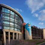 FNB CEO Lytania Johnson takes charge as FirstRand restructures its banking model to boost growth, simplify operations, and enhance customer service.