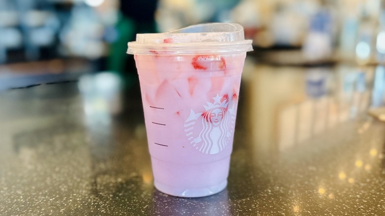 Starbucks launches a Hannah Montana drink, but raspberry flavor triggers debate among longtime fans of the show.