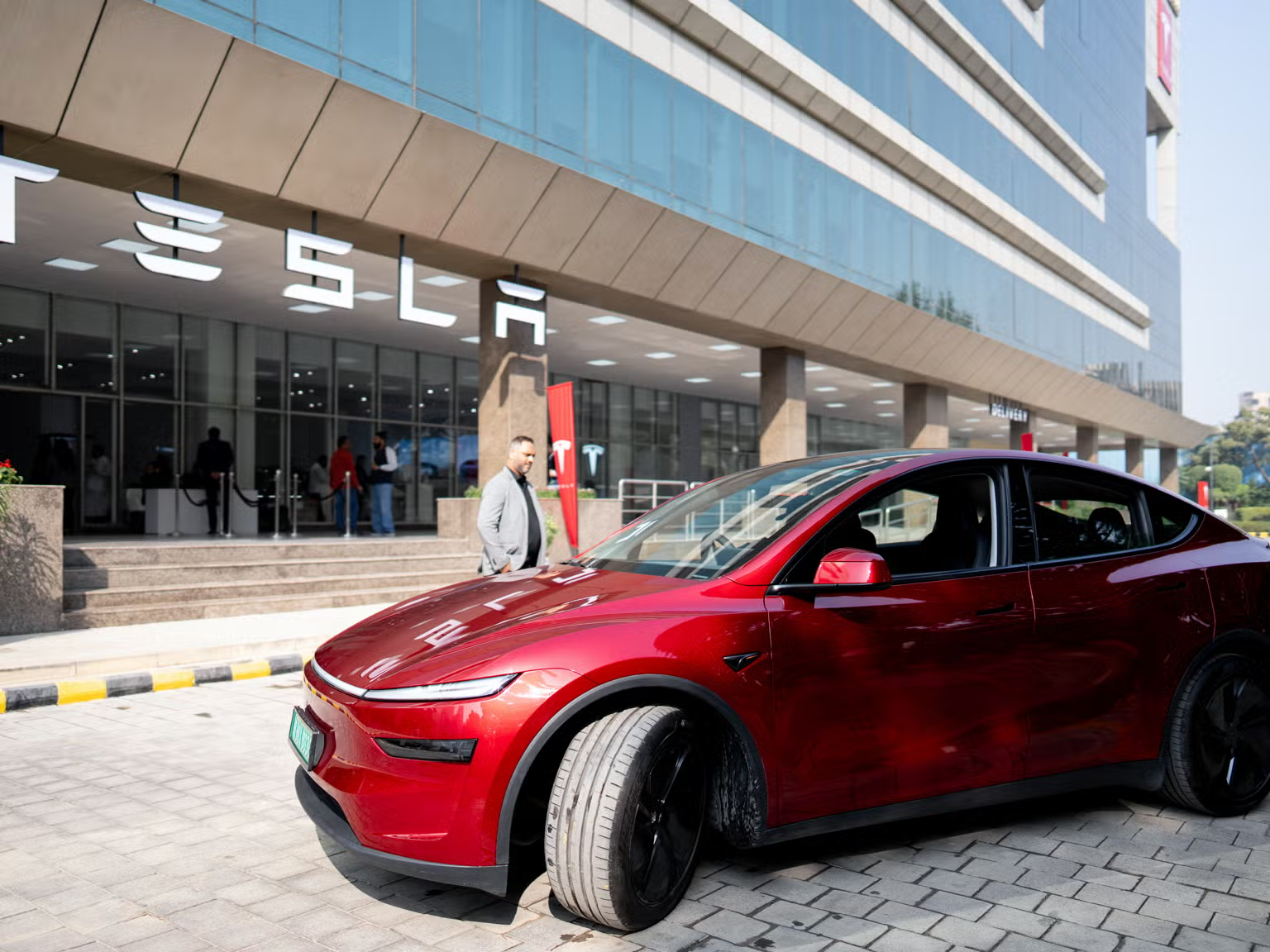 Explore Tesla’s India entry, Model Y L features, pricing, and challenges in the competitive EV market.