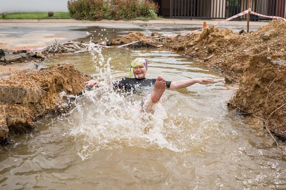 Helen Zille swimming in a pothole goes viral, forcing Joburg to fix a three-year infrastructure issue and raising questions about service delivery.