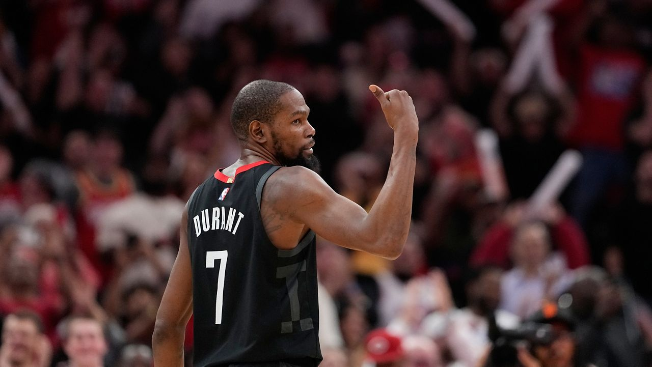 Durant leads Houston to 119-105 win over Suns with clutch shooting and leadership in emotional return game.