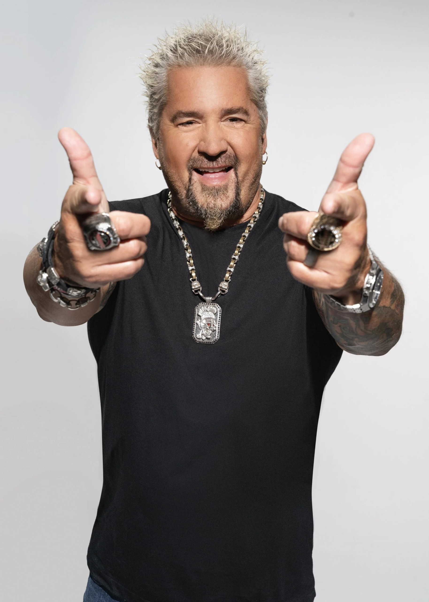 Guy Fieri biography, net worth, age, career, family, restaurants, and latest news in 2026. Full profile of the Food Network star and entrepreneur.