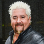 Guy Fieri biography, net worth, age, career, family, restaurants, and latest news in 2026. Full profile of the Food Network star and entrepreneur.