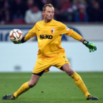 Former Arsenal goalkeeper Alex Manninger dies at 48 after a tragic accident in Austria. A look at his career, legacy, and tributes from football.