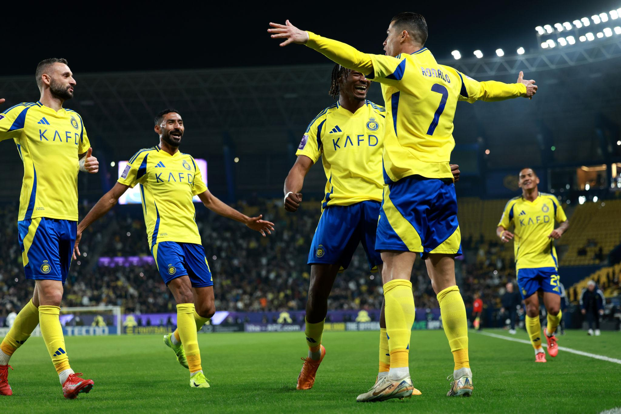 Cristiano Ronaldo News: Defiance, Dominance, and a March Toward 1,000 Goals
A Statement Night in Dubai

Cristiano Ronaldo delivered a performance that combined precision, leadership, and psychological control as Al-Nassr FC secured a commanding 4-0 victory over Al Wasl FC in the AFC Champions League Two quarter-finals.

The match, played at Zabeel Stadium, quickly turned into a showcase of Ronaldo’s enduring influence. Within 11 minutes, he opened the scoring—calmly converting a precise cross to register his 970th career goal, pushing closer to the unprecedented 1,000-goal milestone.

Yet the defining moment of the night extended beyond the scoreboard.

Silencing the Noise: Ronaldo’s Viral Response

Despite his early goal, Ronaldo was subjected to persistent chants of “Messi, Messi” from rival supporters. Instead of ignoring the provocation, he responded directly.

With a composed but assertive demeanor, Ronaldo placed his finger to his lips, signaling silence, before following it with his signature “calma” gesture—urging the crowd to relax. The moment quickly circulated across social media, reinforcing his reputation for responding under pressure with authority rather than distraction.

This was not merely a reaction—it was a calculated assertion of control in a high-stakes environment.

Tactical Control and Clinical Execution

Ronaldo’s opener set the tone for a one-sided contest. Al-Nassr maintained structural dominance, translating early momentum into sustained pressure.

Íñigo Martínez doubled the lead in the 24th minute
Abdulelah Al-Amri added a third just two minutes later
Sadio Mané sealed the result with an 80th-minute finish

Ronaldo remained central to the attacking structure throughout his 67 minutes on the pitch. He recorded 24 touches and three shots, acting as the focal point in a fluid attacking system that consistently destabilized the opposition defense.

The performance illustrated not just scoring ability, but strategic positioning and game management—key factors in knockout football.

The Road to the Semi-Final

The victory confirmed Al-Nassr’s progression to the semi-finals of the AFC Champions League Two, where they will face Al Ahli SC.

The tournament structure itself has undergone adjustments. Originally scheduled as two-legged ties between March 3 and 10, the fixtures were postponed due to impacts from the Iran war. The Asian Football Confederation subsequently shifted to single-leg matches in centralized venues.

Should Al-Nassr advance, they are set to meet Gamba Osaka, who have already secured their place in the final.

This format increases the stakes of each match, placing greater emphasis on immediate performance—an environment where Ronaldo has historically excelled.

Momentum, Milestones, and a Historic Target

Ronaldo’s latest goal is more than a match statistic—it represents a step toward one of football’s most elusive milestones: 1,000 career goals.

His tally, now approaching that mark, underscores a level of longevity rarely seen in elite sport. At 41, he continues to produce decisive contributions in continental competition, maintaining physical output and tactical relevance.

Beyond individual achievements, Al-Nassr’s form reflects a broader upward trajectory. The team has demonstrated consistent attacking cohesion and defensive organization, positioning itself as a serious contender for continental silverware.

Influence Beyond the Pitch

Ronaldo’s impact extends into the cultural and generational fabric of football. His influence remains visible in emerging talents, including Endrick, who recently stated:

“It doesn’t matter where he is, I’ll always follow him.”

Such statements reflect a broader pattern—Ronaldo is not only competing but shaping the aspirations of the next generation.

Simultaneously, narratives surrounding rivalries—particularly with Lionel Messi—continue to surface in stadiums and media discourse, reinforcing the enduring global relevance of both figures.

What Comes Next

The immediate focus shifts to the semi-final clash against Al Ahli SC. A victory would place Al-Nassr within reach of a major continental title, potentially culminating in a final against Gamba Osaka.

There is also a strategic dimension to consider. With the final potentially hosted in Riyadh, Al-Nassr could gain a significant advantage—turning the competition into both a sporting and symbolic milestone for the club.

For Ronaldo, the equation remains consistent:

Maintain scoring output
Guide team progression
Approach the 1,000-goal landmark

Each match now carries dual significance—team success and individual legacy.

Conclusion: Control, Consistency, and Legacy

Cristiano Ronaldo’s latest performance encapsulates three defining traits: control under pressure, consistent output, and a relentless pursuit of legacy.

His response to provocation, combined with decisive on-field execution, illustrates why he remains central to both club success and global football narratives.

As Al-Nassr advances deeper into the competition, the focus sharpens. The semi-final is not just another fixture—it is a gateway to silverware and a stage for Ronaldo to extend an already historic career.