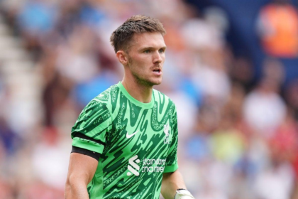 Liverpool beat Everton 2-1 but face goalkeeper concerns. Woodman debut explained with Alisson and Mamardashvili updates.