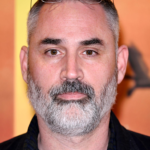 Explore Alex Garland’s career, films, and his role directing the Elden Ring movie set for 2028 with full cast and production insights.