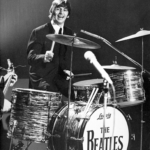 Explore Ringo Starr’s role in The Beatles, his drumming style, vocals, and lasting influence on music history.