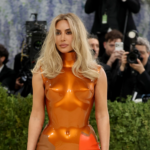 Discover Kim Kardashian’s bold armored look at Met Gala 2026 and its artistic inspiration from the 1960s.