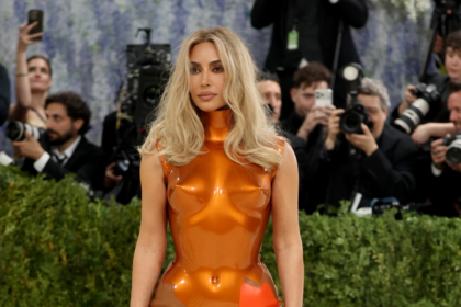 Discover Kim Kardashian’s bold armored look at Met Gala 2026 and its artistic inspiration from the 1960s.