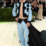 Explore Hudson Williams’ Met Gala 2026 debut, from his Balenciaga matador look to Black Swan-inspired makeup and cultural impact.