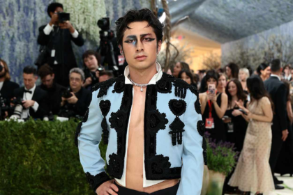 Explore Hudson Williams’ Met Gala 2026 debut, from his Balenciaga matador look to Black Swan-inspired makeup and cultural impact.