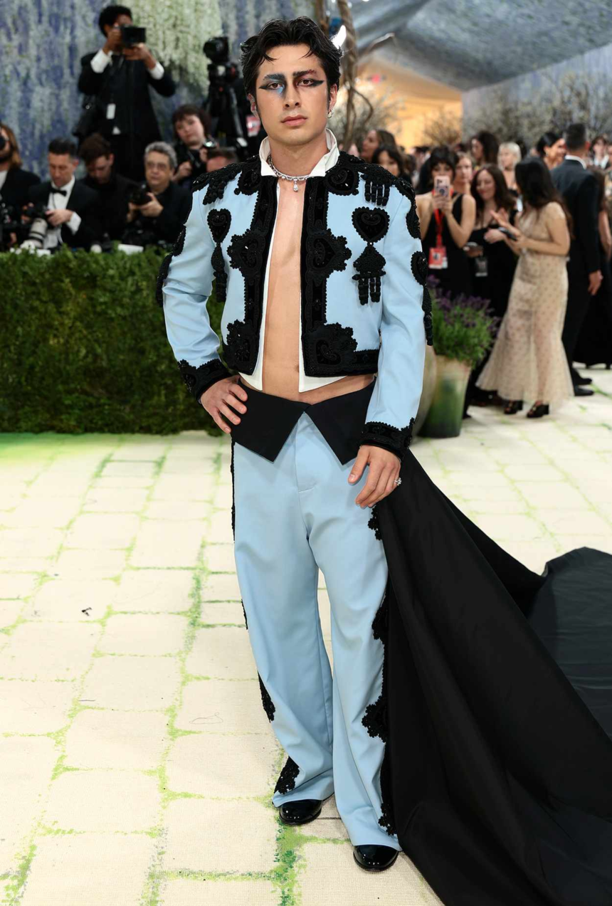 Explore Hudson Williams’ Met Gala 2026 debut, from his Balenciaga matador look to Black Swan-inspired makeup and cultural impact.