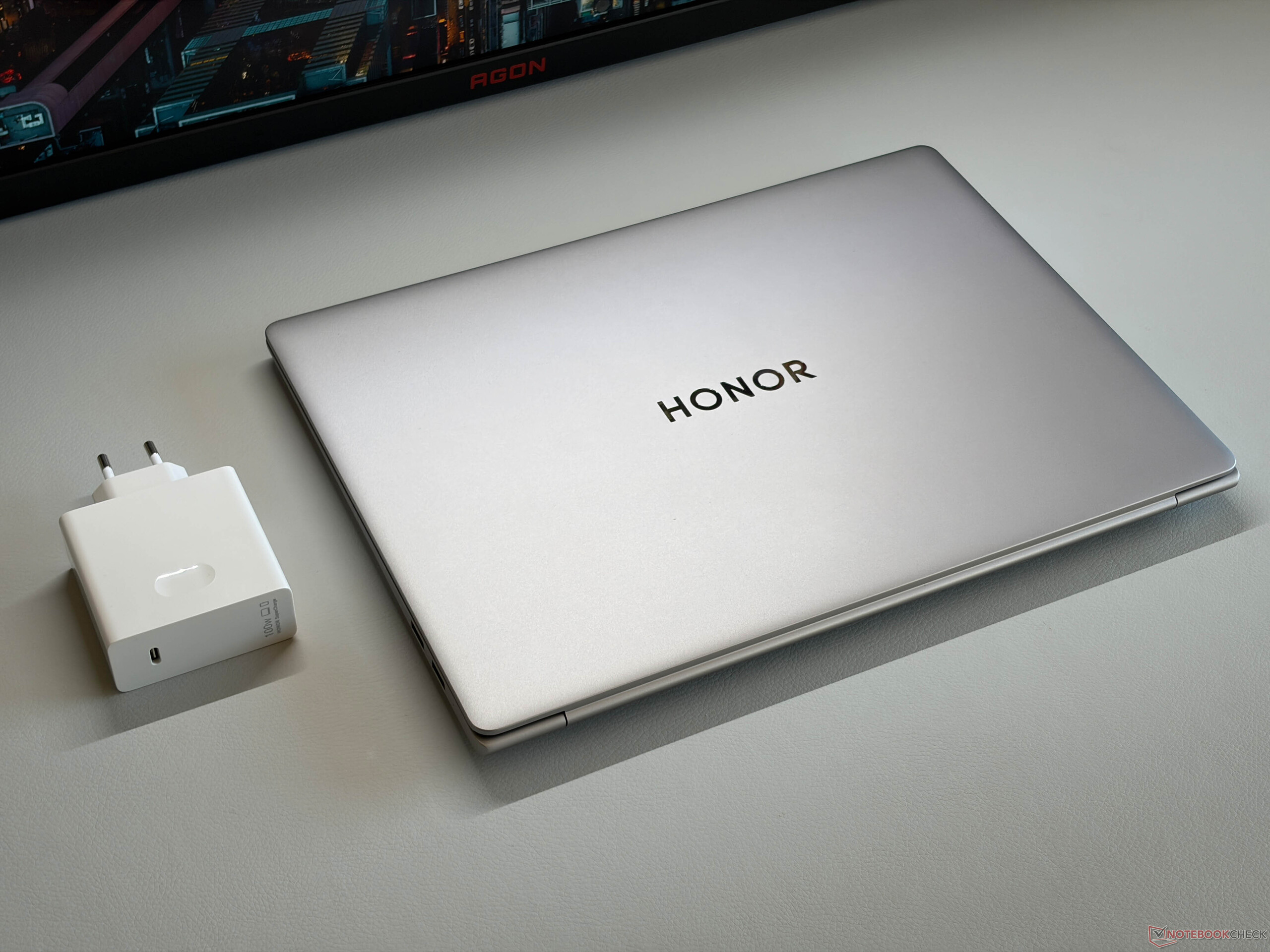 Honor MagicBook Pro 14 (2026) review covering OLED display, battery life, Intel Panther Lake performance, thermals, pricing, and features.