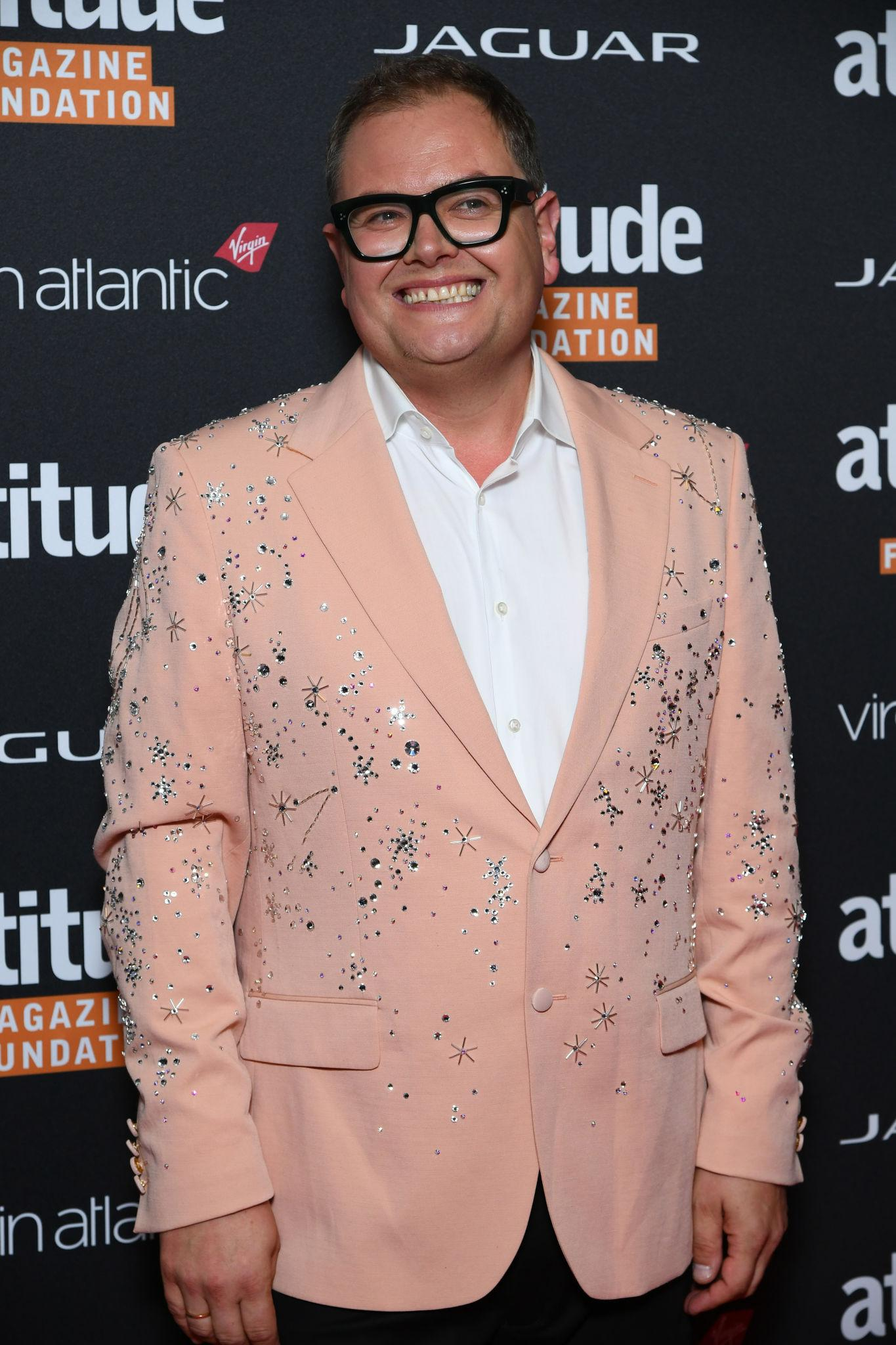 Alan Carr biography covering net worth, age, career, family, relationships, TV shows, BAFTA wins, marriage, comedy tours, and latest updates.