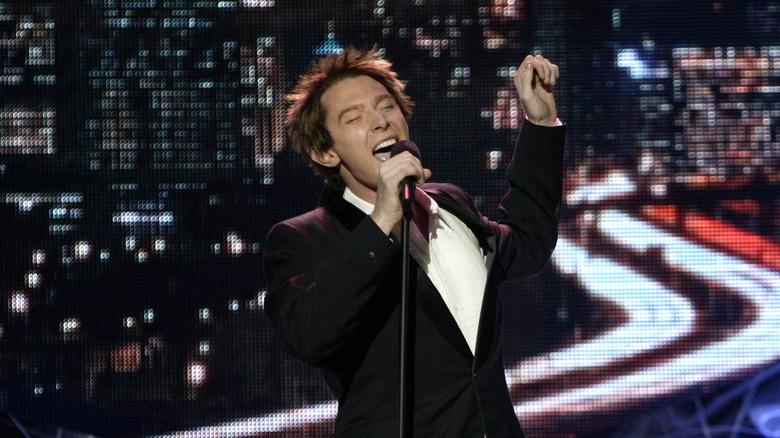 Clay Aiken biography, net worth, age, relationships, family, songs, and American Idol career. Explore his life, music, politics, and current updates.