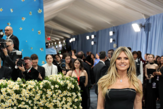 Heidi Klum stunned at the 2026 Met Gala with a marble statue look that sparked debate and went viral across social media.