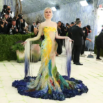 Discover how Emma Chamberlain’s hand-painted Mugler gown brought art to life at the Met Gala 2026 with deep personal inspiration.