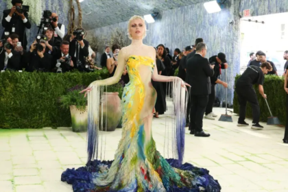 Discover how Emma Chamberlain’s hand-painted Mugler gown brought art to life at the Met Gala 2026 with deep personal inspiration.