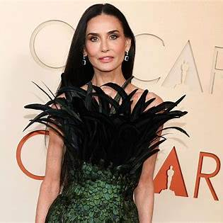 Demi Moore shines at Cannes 2026 as a jury member, wearing Gucci and Jacquemus while sharing powerful views on AI and cinema.