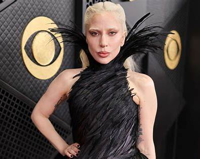 Lady Gaga unveils new songs, joins Prada 2 cast, and breaks tour records in 2026.