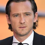Lewis Pullman biography, net worth, age, career, movies, TV shows, family and relationships. Discover his Marvel role and Hollywood rise.