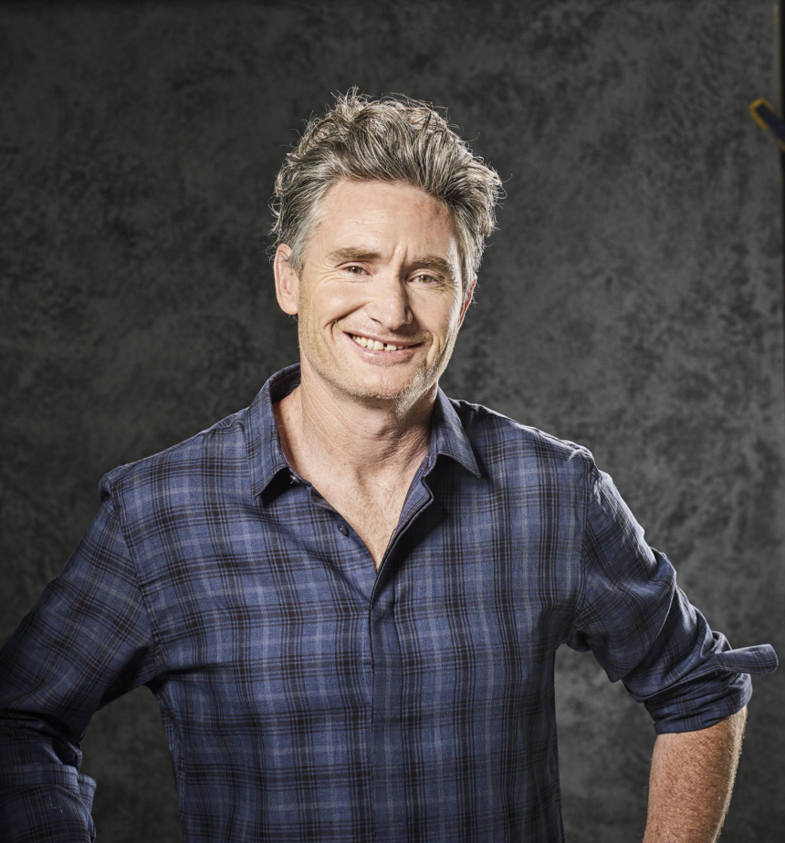 Dave Hughes returns to football after broken ribs and a punctured lung while opening up about sobriety and comedy addiction.