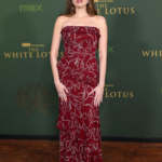 Aimee Lou Wood biography, net worth, age, career, TV shows, family, and relationships. Explore her rise from Sex Education to The White Lotus.