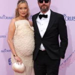 Laura Whitmore impressed at the 2026 BAFTA TV Awards with an elegant maternity look by Mara Hoffman and sustainable spring fashion style.