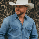 Cody Johnson wins ACM Entertainer of the Year, honors Luke Combs, and tops country radio with “The Fall” in a career-defining moment.