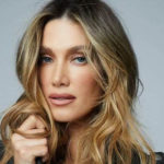 Delta Goodrem biography featuring her age, net worth, husband, Eurovision journey, career highlights, family life, and major achievements.