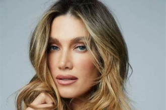 Delta Goodrem biography featuring her age, net worth, husband, Eurovision journey, career highlights, family life, and major achievements.