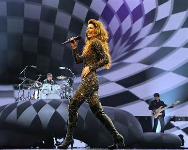 Explore the biggest Shania Twain songs, their impact on country-pop, and details about her new 2026 album Little Miss Twain.