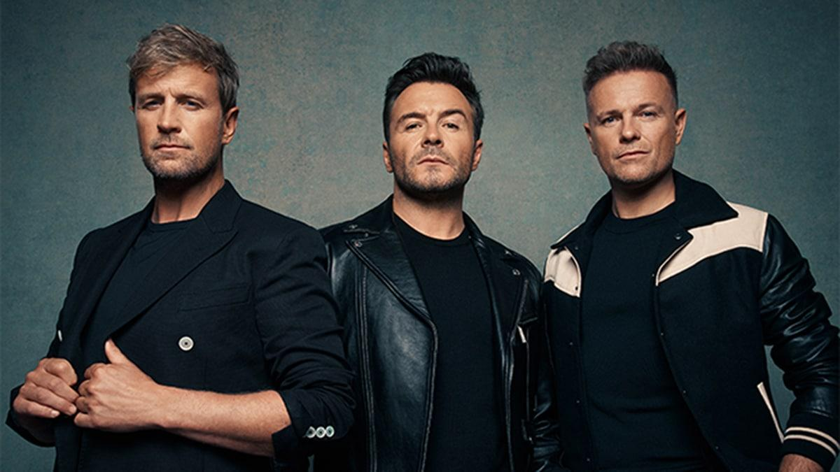Westlife respond to Brian McFadden reunion rumors as Mark Feehily continues recovering from major health issues.