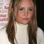 Amanda Bynes returns with her debut EDM-rap single “Girlfriend,” marking a major career shift alongside a dramatic personal transformation.