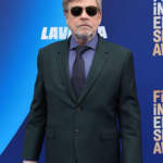 Mark Hamill faced White House criticism after sharing an AI image of Trump in a grave, prompting debate over celebrity speech and political rhetoric.
