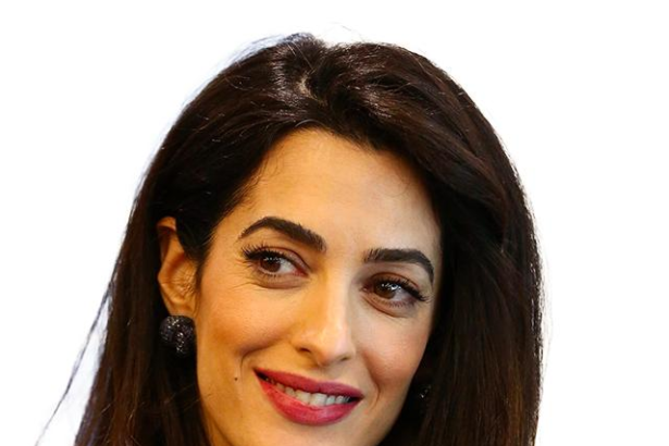 Amal Clooney biography featuring her age, net worth, career, husband George Clooney, twins, family life, legal achievements, and latest 2026 updates.
