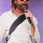 Ronnie Dunn biography, net worth, wife, age, songs, health updates, career milestones, family life, and latest 2026 news in one detailed profile.