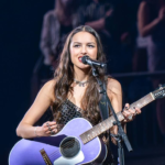 Olivia Rodrigo’s babydoll dresses and knee-high boots are redefining 2026 fashion while sparking major online debate.